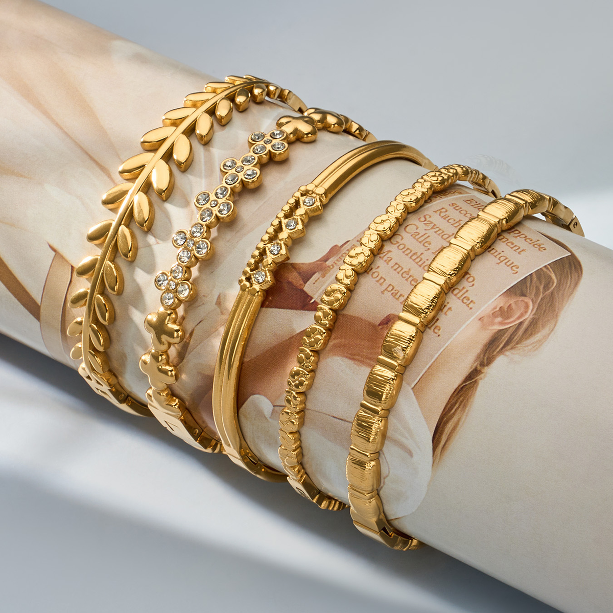 Gold Plated Stackable Floral Bangle Set - on wrist