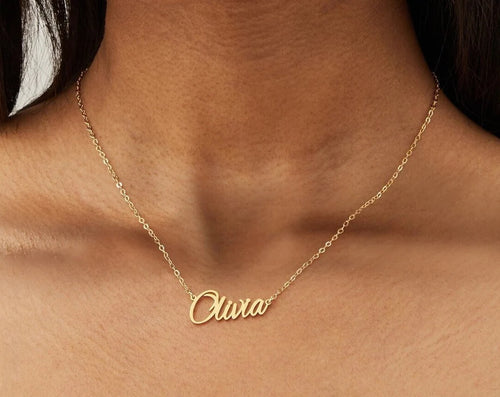 Gold 925 sterling silver script name necklace worn on neckline