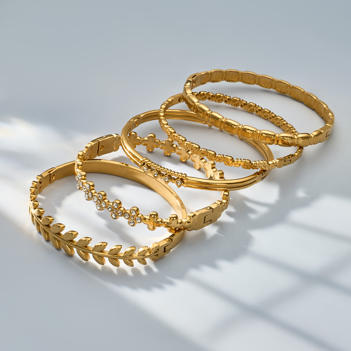 Gold Plated Stackable Floral Bangle Set - flat lay