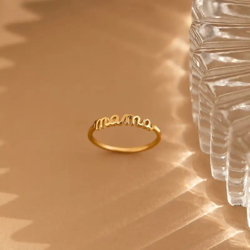 Gold mama script ring macro shot