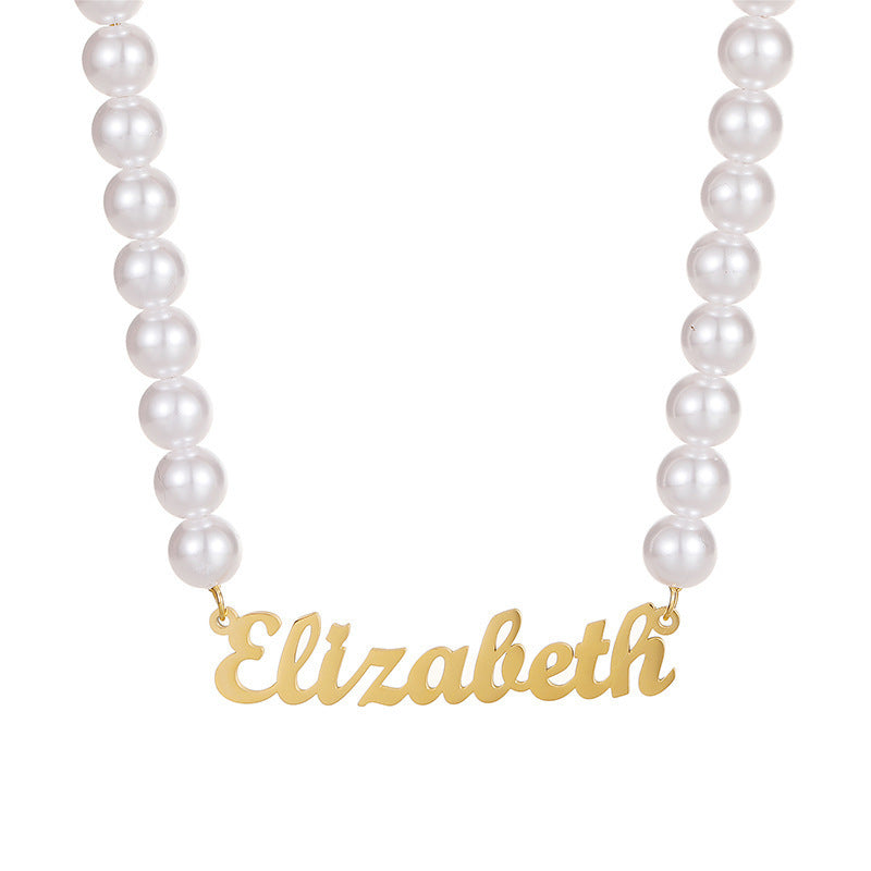 Gold script name pearl choker necklace on white background