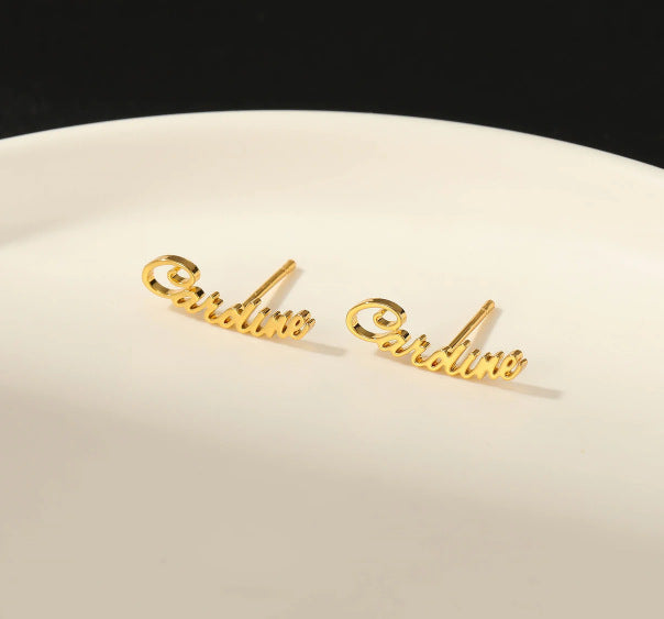 Pair of gold cursive name stud earrings